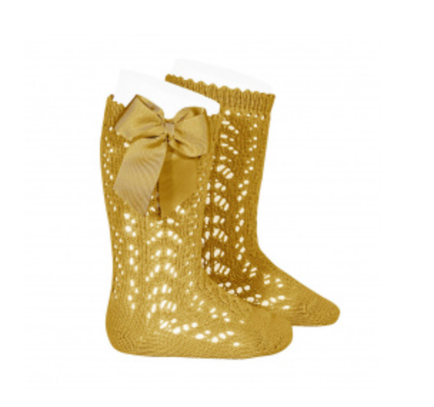 CALCETINES ALTOS CALADOS CON LAZO MOSTAZA